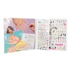 An open book with pages of nail stickers and illustrations of hands and nails. Anteprima dell’immagine prodotto