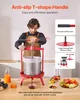 A man is using a red fruit press in a kitchen setting, with various fruits and juice displayed on a table. Voir les images du produit