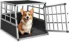 A corgi dog sits inside a silver and black dog crate with the door open. Produktbild-Vorschau