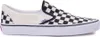 A side view of a Vans slip-on shoe with a checkerboard pattern. Produktbild-Vorschau