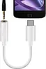A white USB-C to 3.5mm headphone adapter cable is shown against a white background, with a phone and a headphone jack connector visible. Produktbild-Vorschau