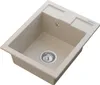 A top-down, slightly angled view of a beige composite kitchen sink with a drain and overflow. Produktbild-Vorschau