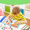 A young boy is using a math learning toy at a table. Náhľad obrázku produktu