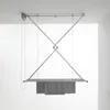 A ceiling-mounted clothes drying rack with towels hanging from it. Podgląd zdjęcia produktu