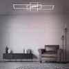 A modern living room with a ceiling light, armchair, and media console. Anteprima dell’immagine prodotto