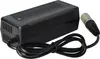 A black power adapter with a coiled cable and a connector. Produktbild-Vorschau