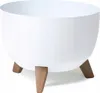 A white planter pot with three wooden legs is shown against a white background. Náhled obrázku produktu
