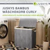 A laundry basket in a room with a washing machine. Náhľad obrázku produktu