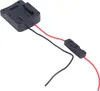 A black battery adapter with red and black wires and a switch, isolated on a white background. Produktbild-Vorschau