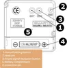 Diagram of the back of a clock showing buttons and battery compartment with labels. Anteprima dell’immagine prodotto