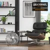 A modern living room with a bookshelf, a chair, and a fan. Náhled obrázku produktu