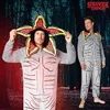 Two men modeling Stranger Things Demogorgon costumes in a dark forest setting. Náhľad obrázku produktu