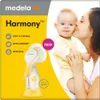 A mother kissing her baby, with a breast pump displayed next to them. Podgląd zdjęcia produktu