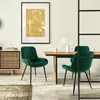 A dining room scene with chairs around a table, a cabinet, and artwork on the wall. Náhľad obrázku produktu