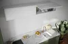A modern kitchen scene with a white wall-mounted cabinet above a marble countertop with a sink and faucet. Produktbild-Vorschau