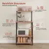 A kitchen shelf unit with various kitchen appliances and items displayed on its shelves. Produktbild-Vorschau