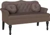 A brown Chesterfield sofa with two round cushions and decorative studs along the top edge, presented on a white background. Náhľad obrázku produktu