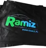 A close-up of a black product cover with a logo and text. Produktbild-Vorschau