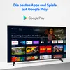 A television screen displaying the Google Play interface with various apps and movie posters. Produktbild-Vorschau