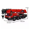 A red and black toy crane truck with dimensions indicated by measurement lines and text. Voir les images du produit