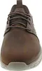 A close-up, front-facing view of a brown leather Skechers shoe. Voir les images du produit