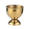 A golden egg cup on a white background. Produktbild-Vorschau