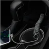 A coiled USB-C charging cable is connected to a smartphone placed in a car's cup holder, next to the gear shifter. Anteprima dell’immagine prodotto