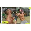 Two male fighters in a boxing match, with a blurred background of a residential area. Produktbild-Vorschau