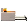 A side view of a light gray sofa bed with its mattress frame extended. Voir les images du produit