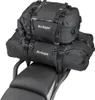 Two black motorcycle luggage bags stacked on top of each other, placed on a motorcycle seat. Náhľad obrázku produktu