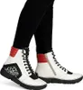 A close-up shot of a pair of women's high-top boots. Náhled obrázku produktu
