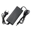 A black power adapter with two cables and a European plug, shown on a white background. Produktbild-Vorschau