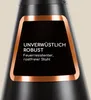 Close-up of a black garden fireplace with copper accents, featuring text highlighting its features. Produktbild-Vorschau