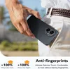A person's hand is placing a black smartphone case into their pocket. Produktbild-Vorschau