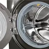 Close-up view of the inside of a washing machine drum with the door open. Produktbild-Vorschau