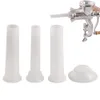 A meat grinder attachment set with three funnels and a base, along with a manual meat grinder. Podgląd zdjęcia produktu