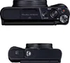 Top and bottom views of a black Canon PowerShot digital camera. Podgląd zdjęcia produktu