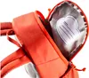 A close-up view of the inside of an orange backpack, showing a name tag. Voir les images du produit