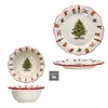 A set of Christmas-themed dinnerware, including plates and bowls, displayed against a white background. Náhled obrázku produktu