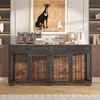 A dog crate furniture piece is displayed in a room setting, with decorative items on top and shelves in the background. Produktbild-Vorschau