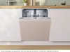 A fully integrated Bosch dishwasher with its door open, revealing the interior racks, set within a modern kitchen environment. Produktbild-Vorschau