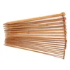 A collection of wooden knitting needles of various sizes, fanned out on a white background. Podgląd zdjęcia produktu