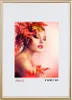 A framed image of a woman with autumn leaves in her hair. Produktbild-Vorschau