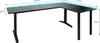 A black L-shaped gaming desk with blue LED lighting along the top edge, shown from a slightly elevated angle. Náhled obrázku produktu