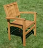 A wooden chair sits on a grassy lawn. Produktbild-Vorschau