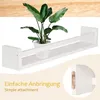 A white wooden shelf with a potted plant on it, and a close-up of the mounting hardware. Produktbild-Vorschau