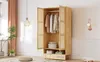A bedroom or living room setting with a wooden wardrobe. Anteprima dell’immagine prodotto
