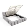 A bed frame with the mattress support lifted, revealing storage space underneath. Produktbild-Vorschau