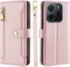 A pink leather phone case with a zipper pocket and a detachable wrist strap is shown. Produktbild-Vorschau
