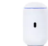 A white cylindrical electronic device with a blue light strip at the top and a black oval sensor on the front, set against a white background. Náhled obrázku produktu